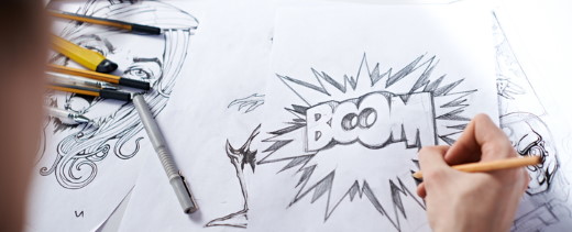 Comiczeichner zeichnet Schriftzug "Boom"